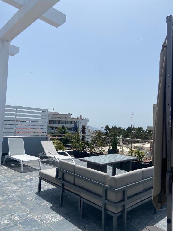 Rooftop Sea View — White Coral