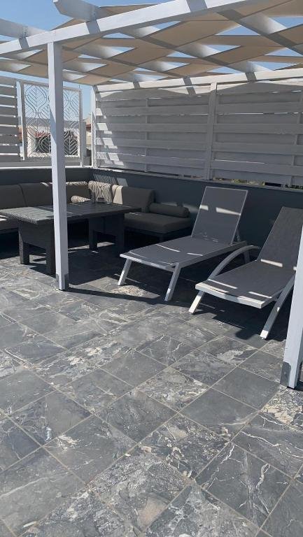 Rooftop Lounge — White Coral